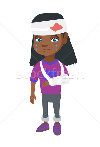 African girl with broken arm and bandaged head. Stock photo © RAStudio