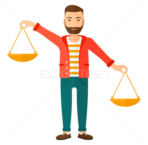 Businessman with scales. Stock photo © RAStudio