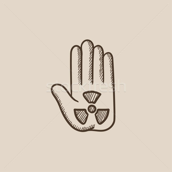 Ionizing radiation sign on a palm sketch icon. Stock photo © RAStudio