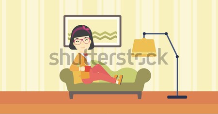 Wioman lying with cup of tea vector illustration. Stock photo © RAStudio