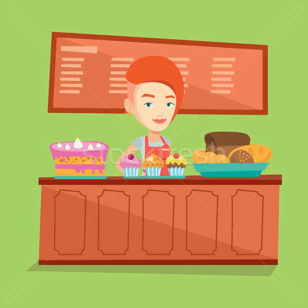 Worker standing behind the counter at the bakery. Stock photo © RAStudio