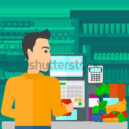 Cashier at supermarket checkout. Stock photo © RAStudio