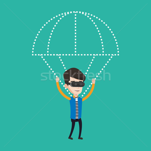 Happy man in vr headset flying with parachute. Stock photo © RAStudio