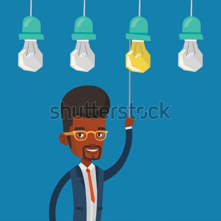 Férfi üzlet ötlet üzletember akasztás villanykörte Stock fotó © RAStudio