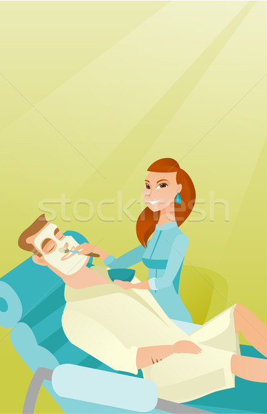 Man in beauty salon during cosmetology procedure Stock photo © RAStudio