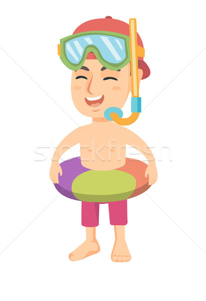 Boy with inflatable ring, diving mask and snorkel. Stock photo © RAStudio