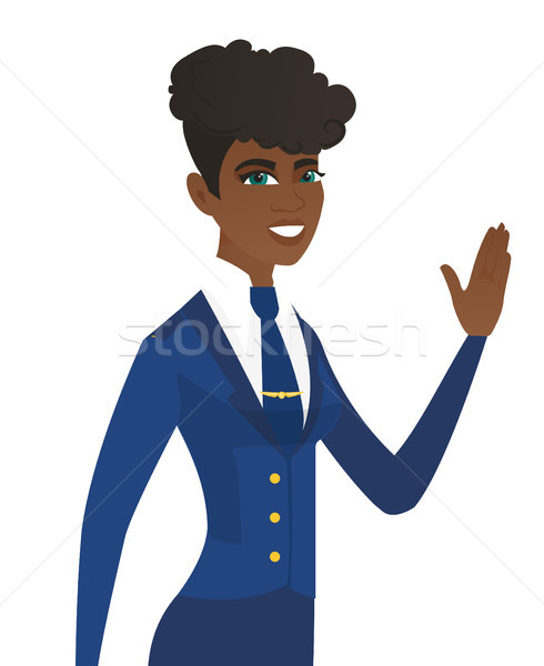 Young african-american stewardess waving her hand. Stock photo © RAStudio