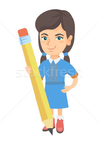 Stock photo: Caucasian kid girl standing with a huge pencil.