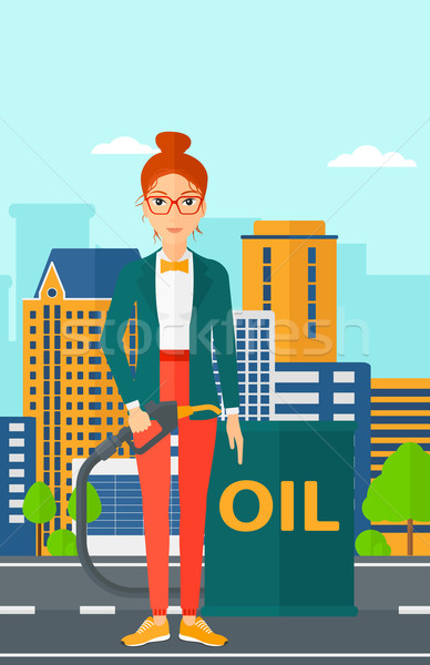 Woman with oil can and filling nozzle. Stock photo © RAStudio