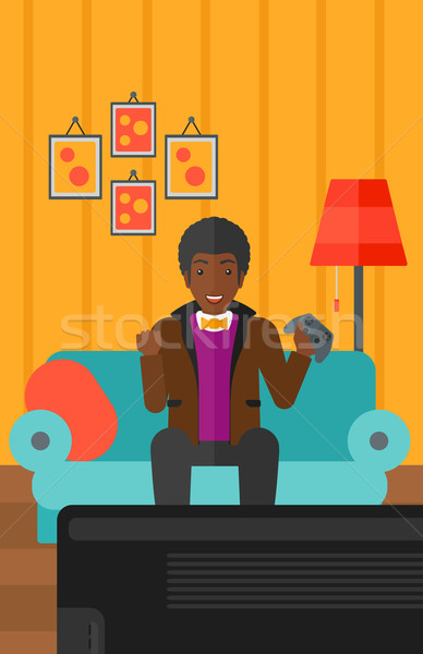 Man playing video game. Stock photo © RAStudio