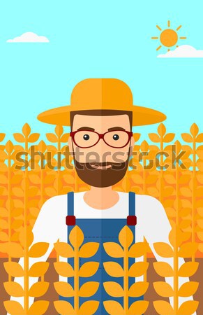 Farmer with pitchfork. Stock photo © RAStudio