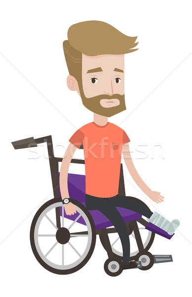 Man with broken leg sitting in wheelchair. Stock photo © RAStudio
