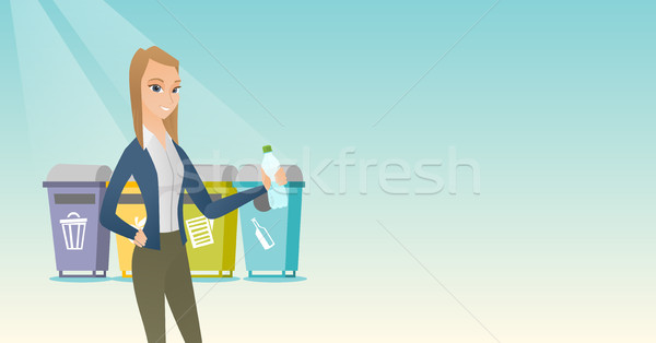 Woman throwing away plastic bottle. Stock photo © RAStudio