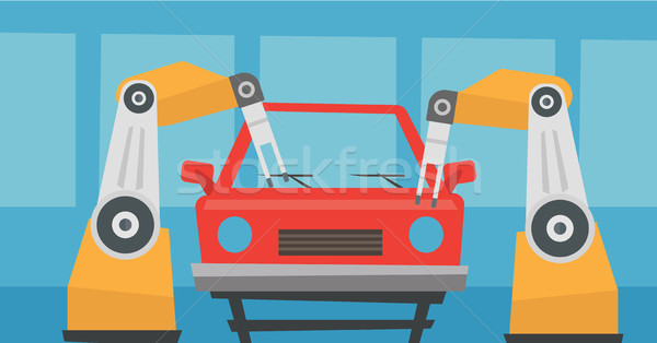 Robotic arm assembling car in assembly shop. Stock photo © RAStudio