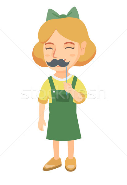 Little caucasian girl with a fake mustache. Stock photo © RAStudio