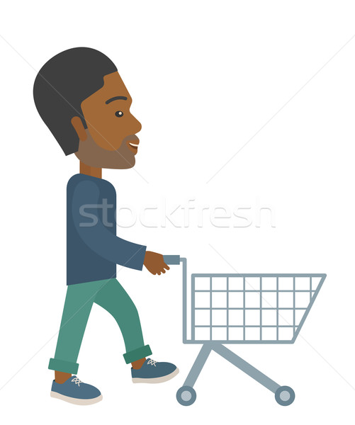 Stock photo: Man with empty cart.