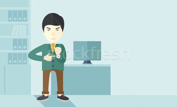 Chinese man is angry pointing his watch. Stock photo © RAStudio