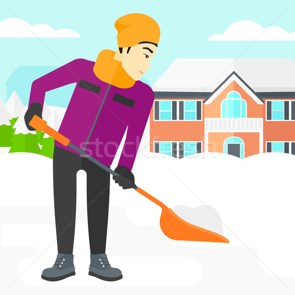 Man shoveling and removing snow. Stock photo © RAStudio