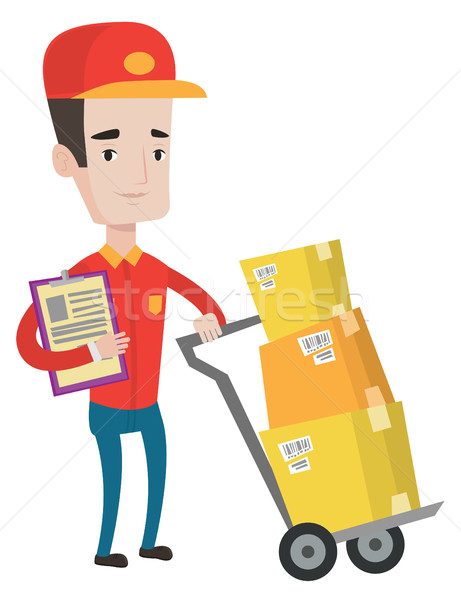 Delivery man with cardboard boxes. Stock photo © RAStudio