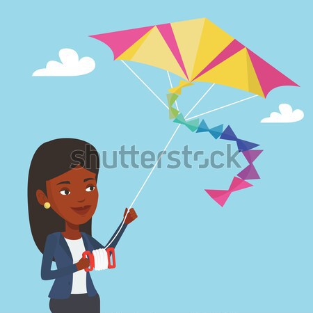 Young man flying kite vector illustration. Stock photo © RAStudio