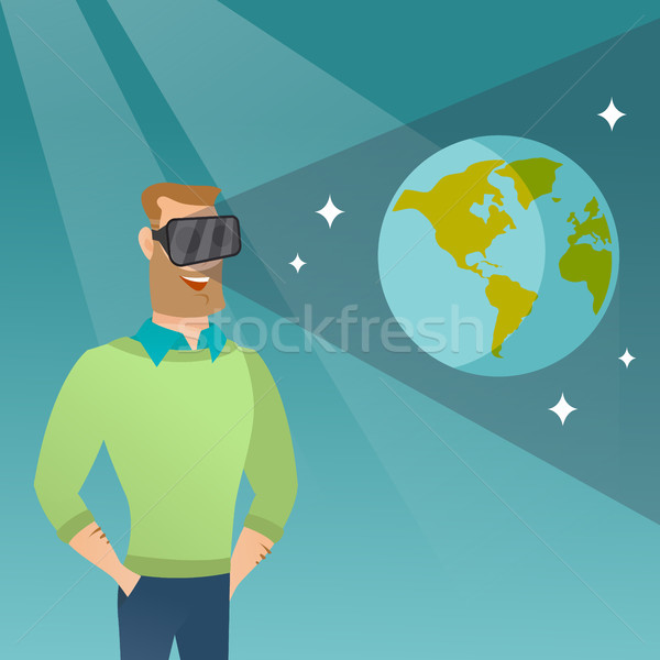 Stock photo: Caucasian man in vr headset getting in open space.