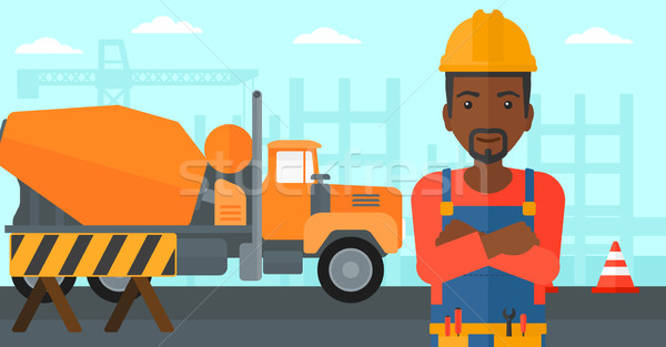Friendly builder with arms crossed. Stock photo © RAStudio