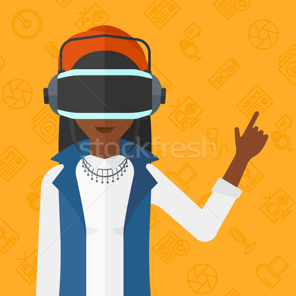 женщину виртуальный реальность гарнитура указывая Сток-фото © RAStudio