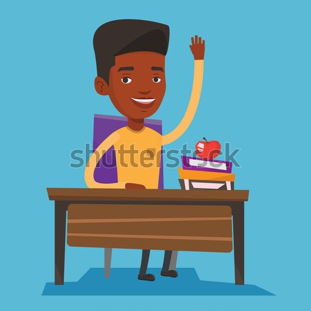 Student raising hand in class for an answer. Stock photo © RAStudio
