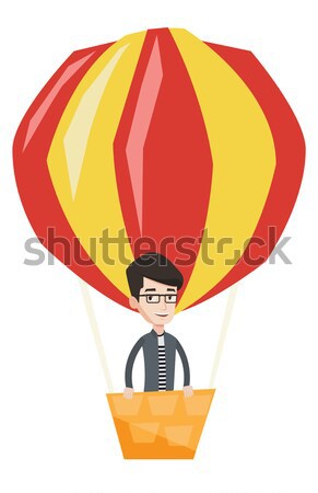 Stock fotó: Fiatalember · repülés · hőlégballon · ázsiai · férfi · derűs