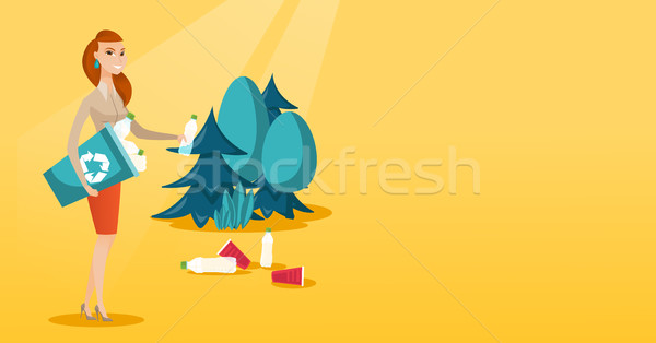 Woman collecting garbage in forest. Stock photo © RAStudio