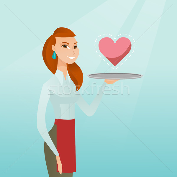 Waitress carrying a tray with a heart. Stock photo © RAStudio