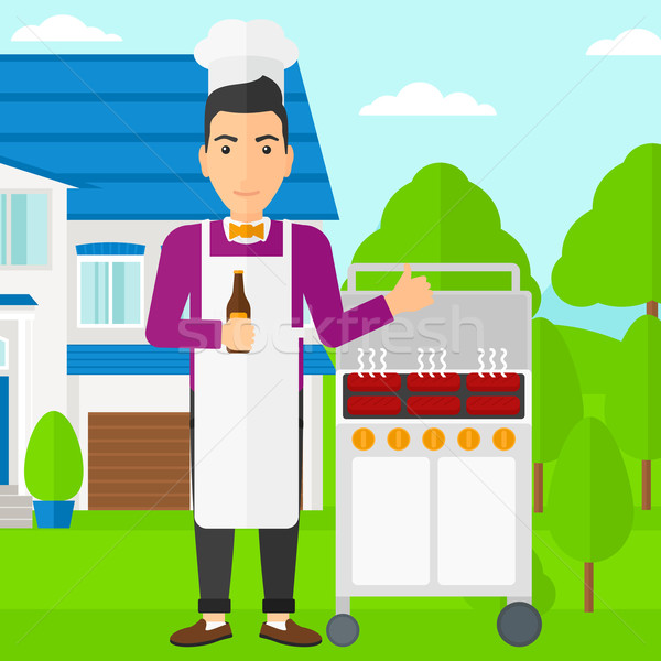 Homme barbecue permanent barbecue maison Photo stock © RAStudio