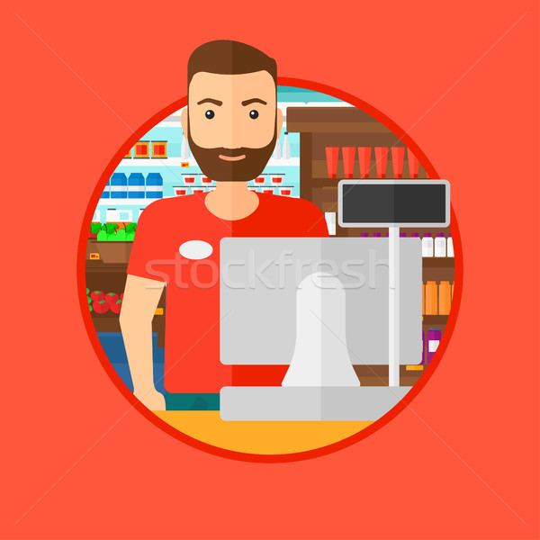 Cashier standing at the checkout in supermarket. Stock photo © RAStudio