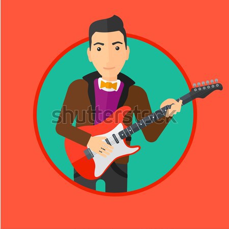Músico jugando guitarra eléctrica jóvenes hombre Foto stock © RAStudio