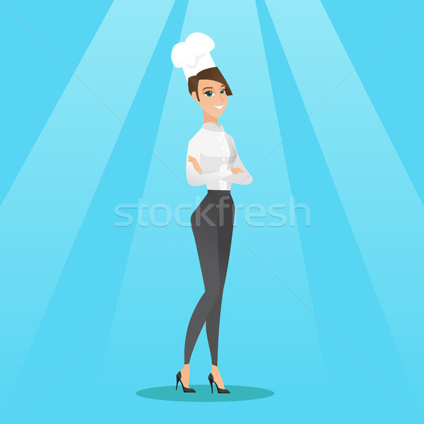Stock photo: Confident female chief cook with arms crossed.