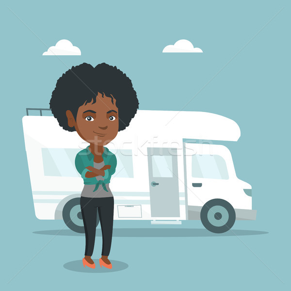 African woman standing in front of motorhome. Stock photo © RAStudio