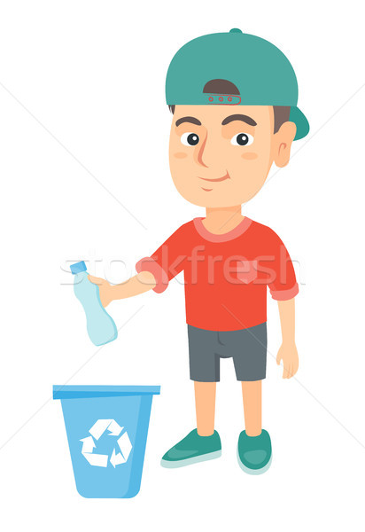 Boy throwing plastic bottle in recycle bin. Stock photo © RAStudio