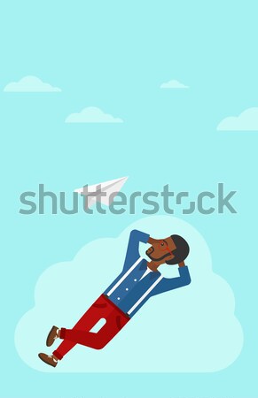 Mujer de negocios nube mirando vuelo papel avión Foto stock © RAStudio