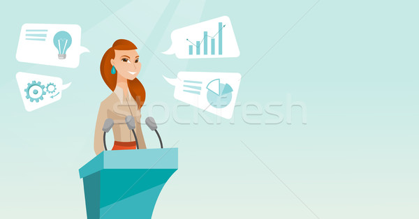 Business woman giving speech at business seminar. Stock photo © RAStudio