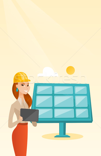 Female worker of solar power plant. Stock photo © RAStudio