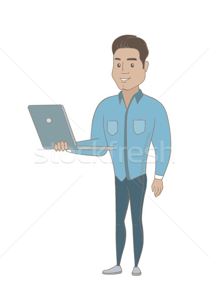 Foto stock: Jovem · hispânico · empresário · usando · laptop · sorridente