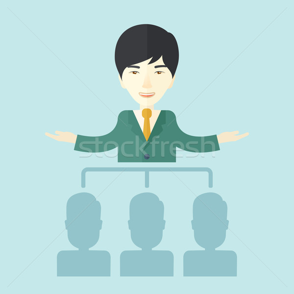 Asian man giving a buisness speech. Stock photo © RAStudio