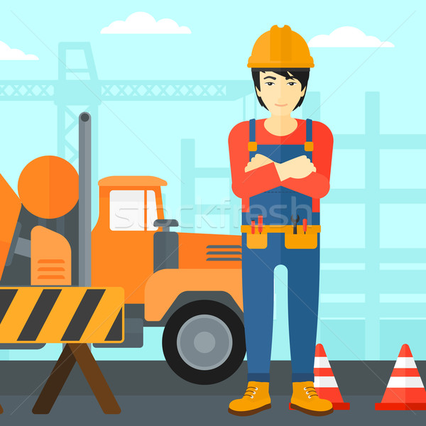 Friendly builder with arms crossed. Stock photo © RAStudio