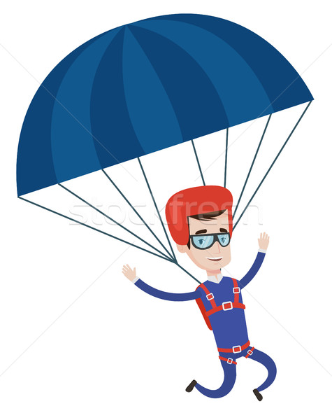 Stock photo: Young happy man flying with parachute.
