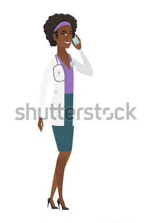 African-american doctor showing victory gesture. Stock photo © RAStudio