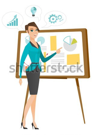 Doctor holding clipboard with papers. Stock photo © RAStudio