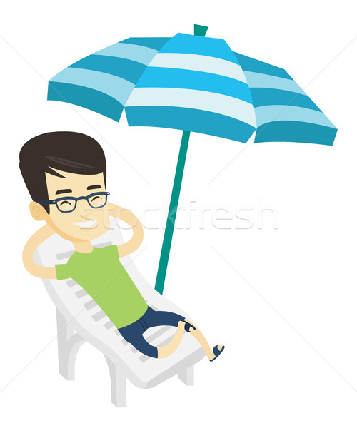 Człowiek relaks leżak młodych asian posiedzenia Zdjęcia stock © RAStudio