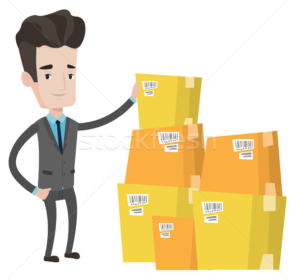 Businessman checking boxes in warehouse. Stock photo © RAStudio
