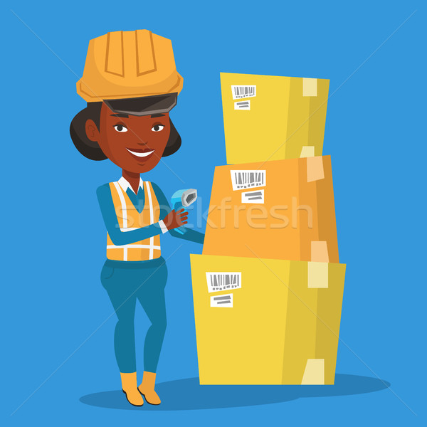 Warehouse worker scanning barcode on box. Stock photo © RAStudio