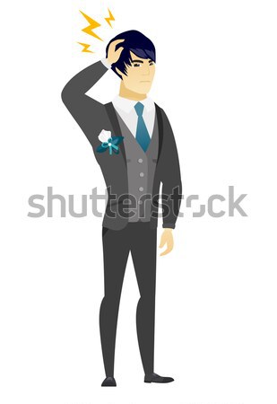 Asian groom holding hand behind head. Stock photo © RAStudio
